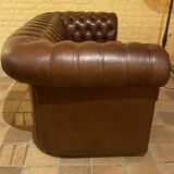 brown leather 2-seater Chesterfield sofa