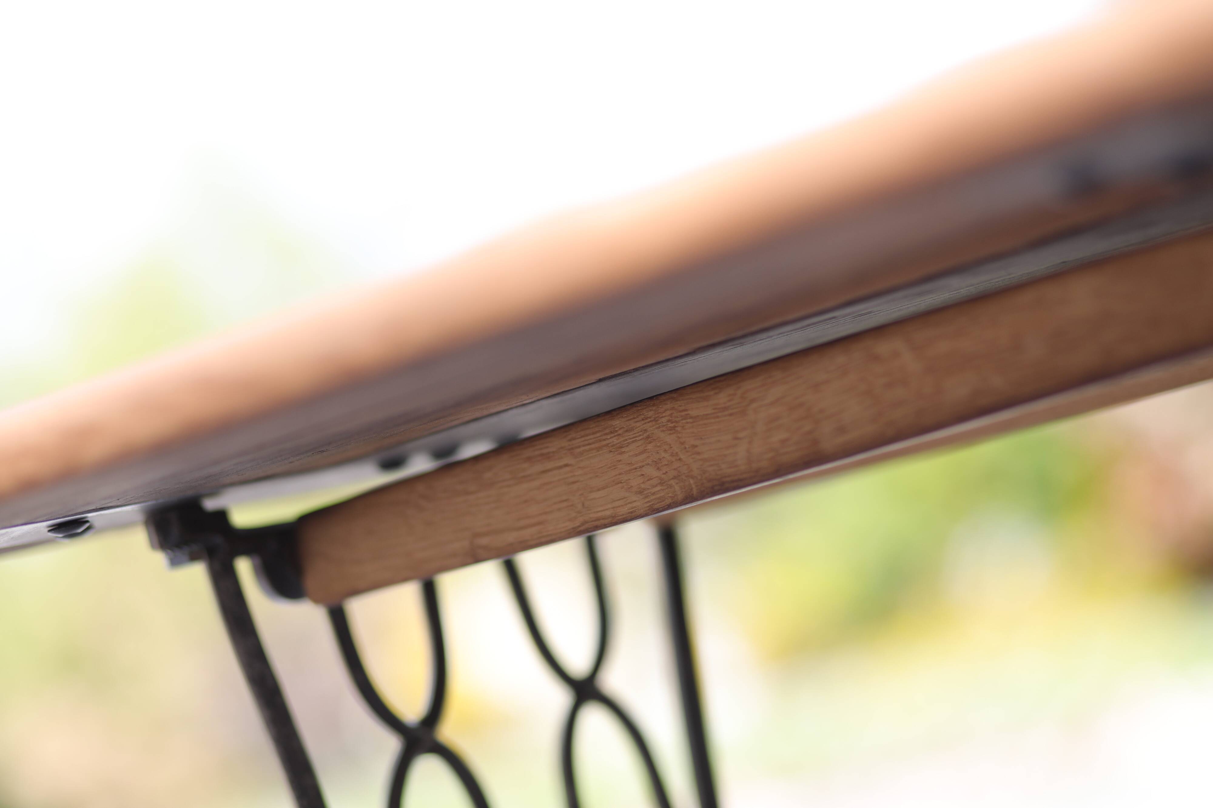 Old industrial table with sewing machine base – solid wood