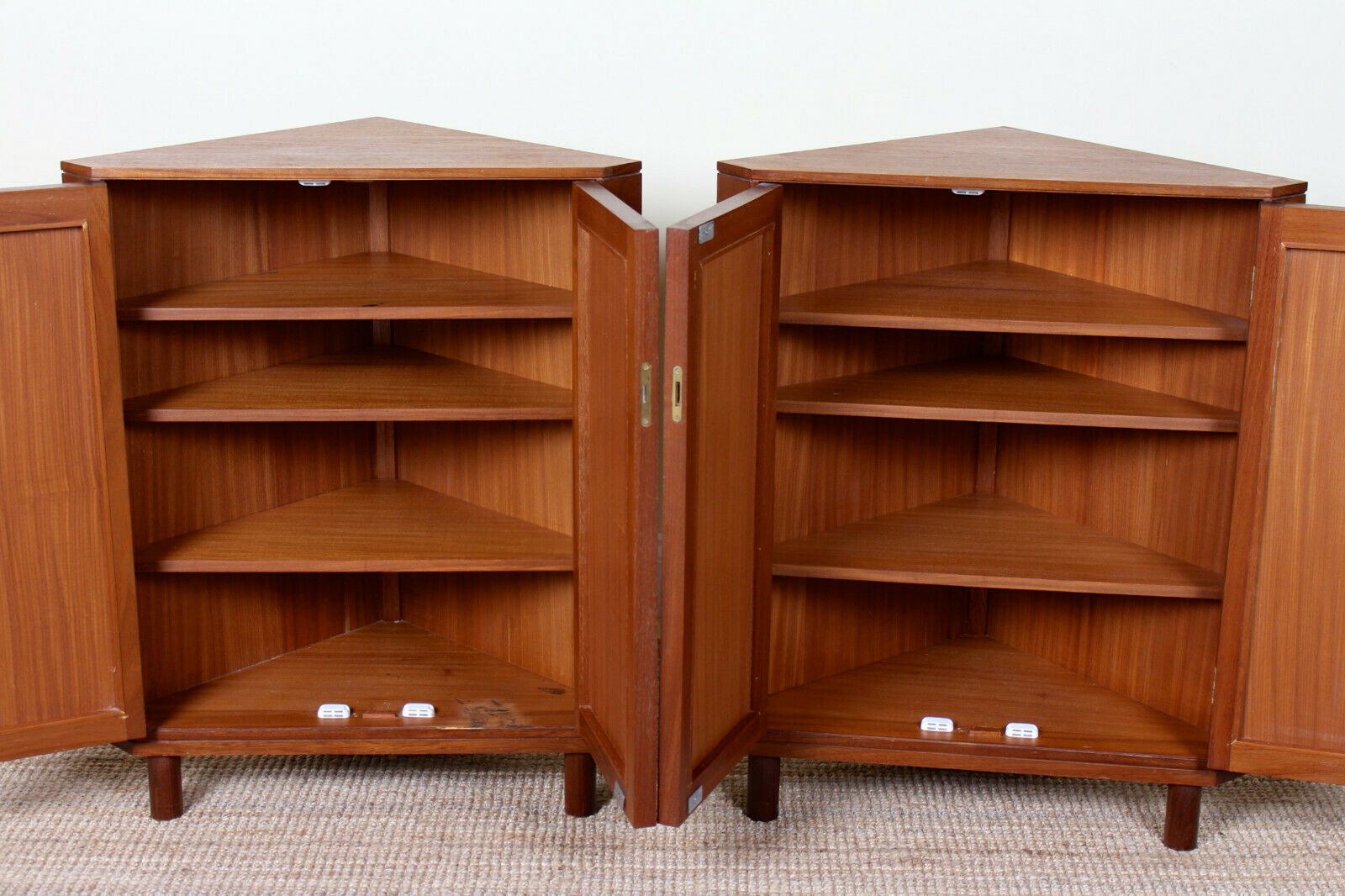 Pair of Danish teak corner cabinets dating from the mid-twentieth century