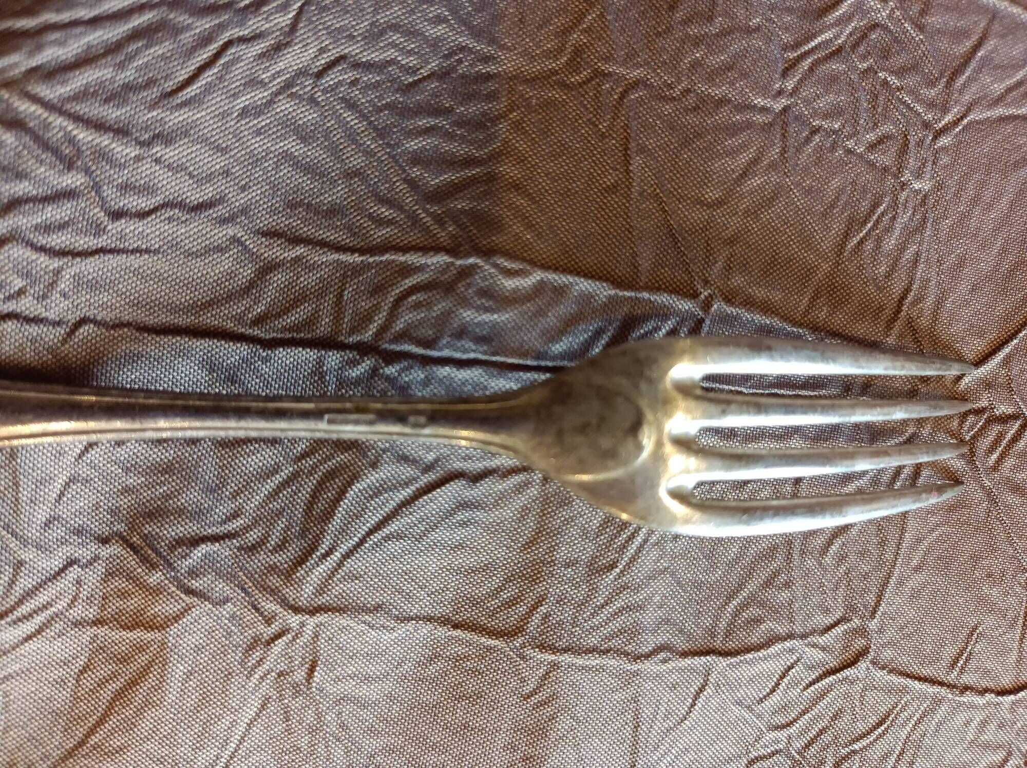 5 silver forks