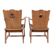Pair of brutalist oak throne chairs with rush seats – Netherlands, 1930s