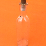Embossed graduated apothecary bottle 1950's