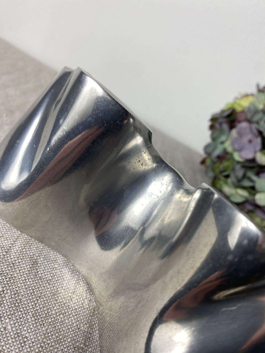 Brushed aluminum candle holder