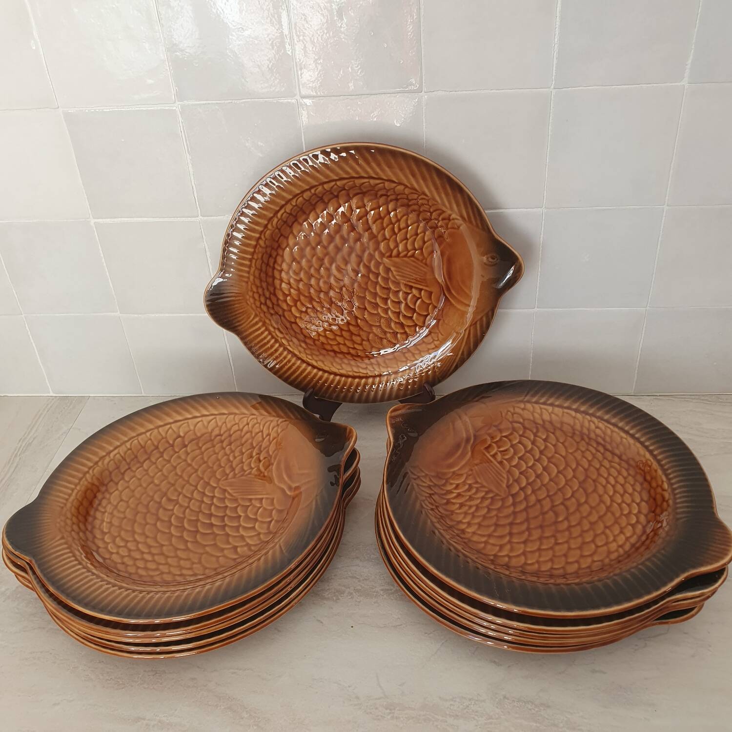 Sarreguemines / 11 earthenware fish-shaped plates