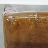 Stylish armchair made of cowhide leather with a unique design and beautiful finish