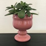 Pink flowerpot on stand