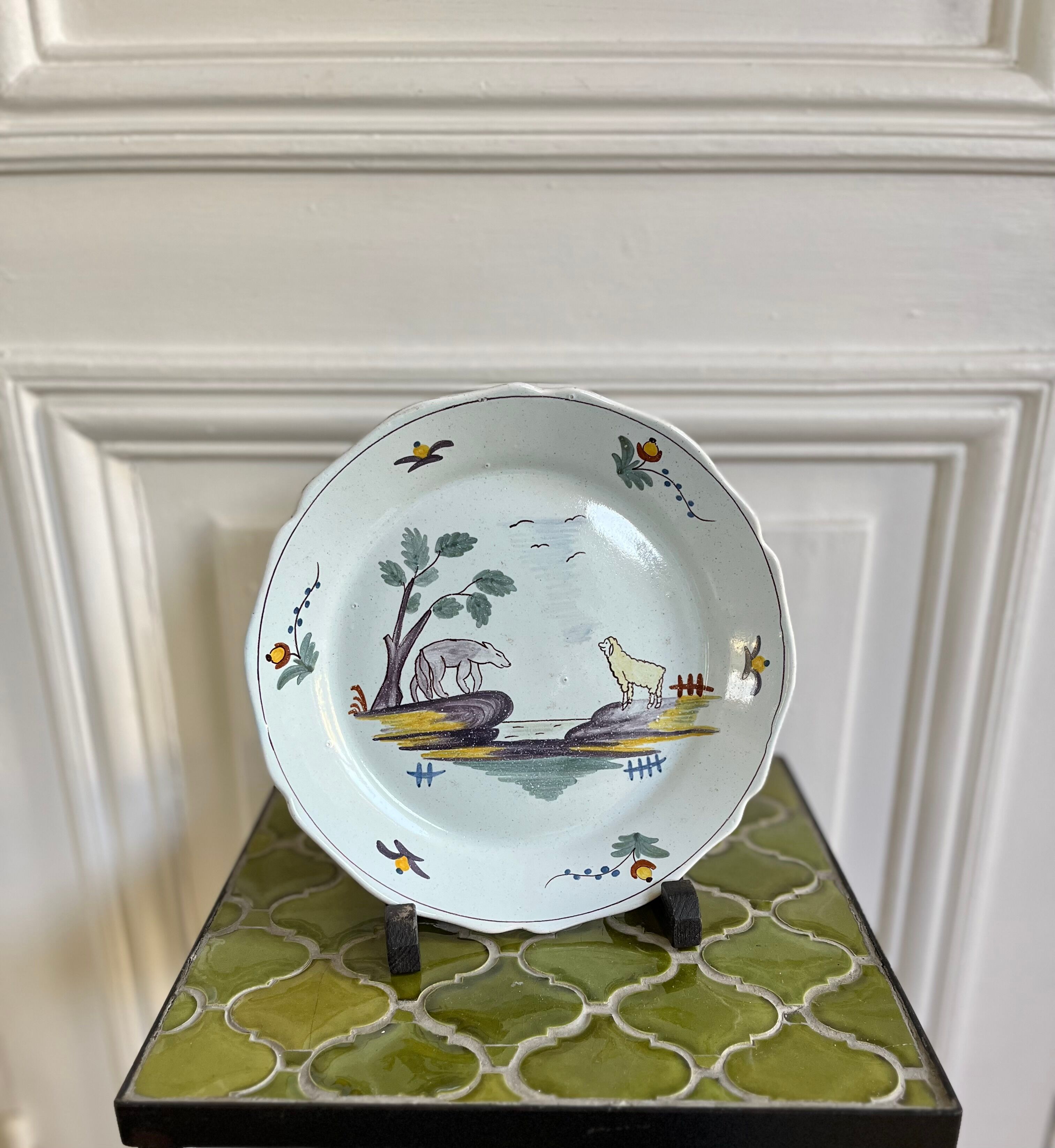 Decorative ceramic plate with "The Wolf and the Lamb" design