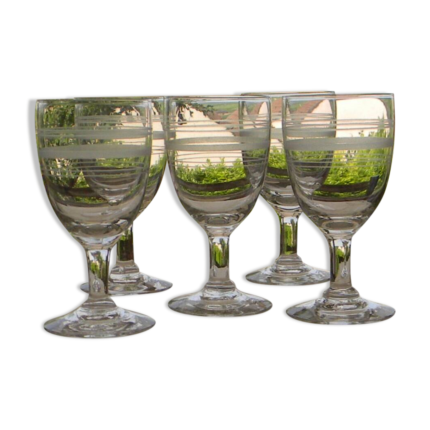 Set of 5 antique bistro glass water glasses.