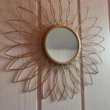 Sun mirror in gilded metal