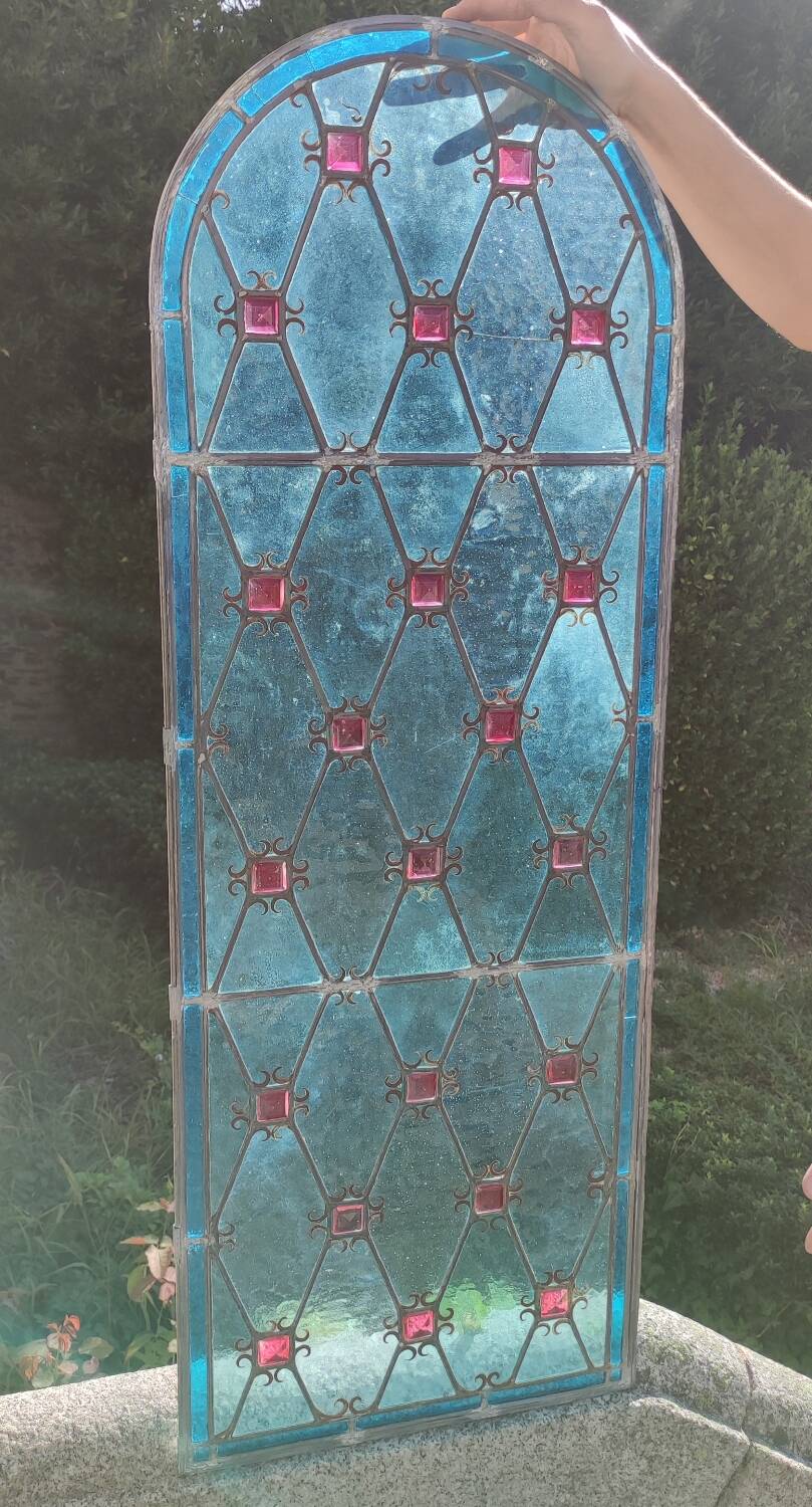 Old stained glass window in the Middle Ages style