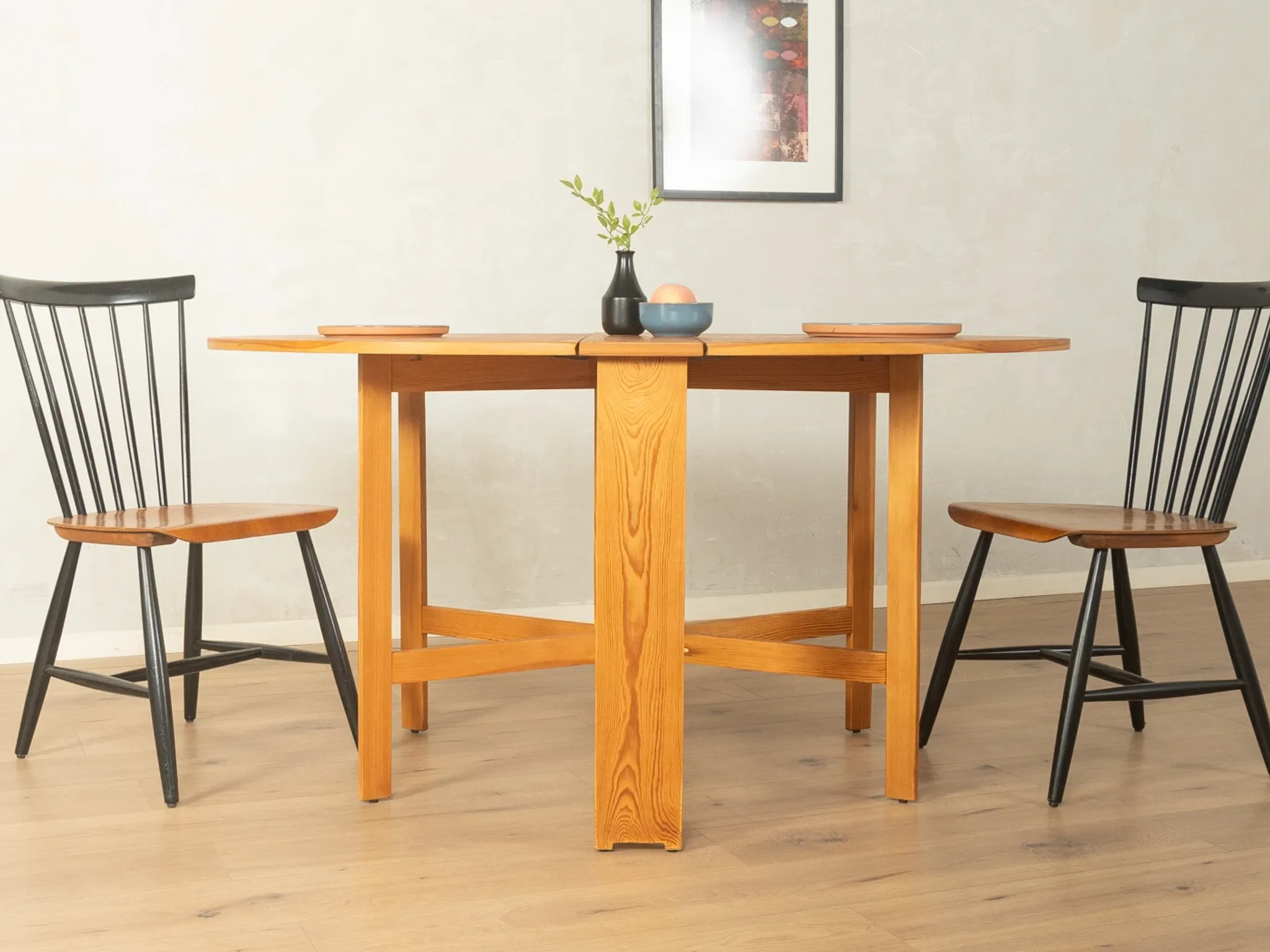 Practical folding table from the 1980s made of light brown pine wood