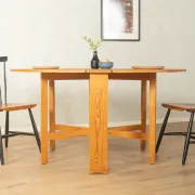 Practical folding table from the 1980s made of light brown pine wood