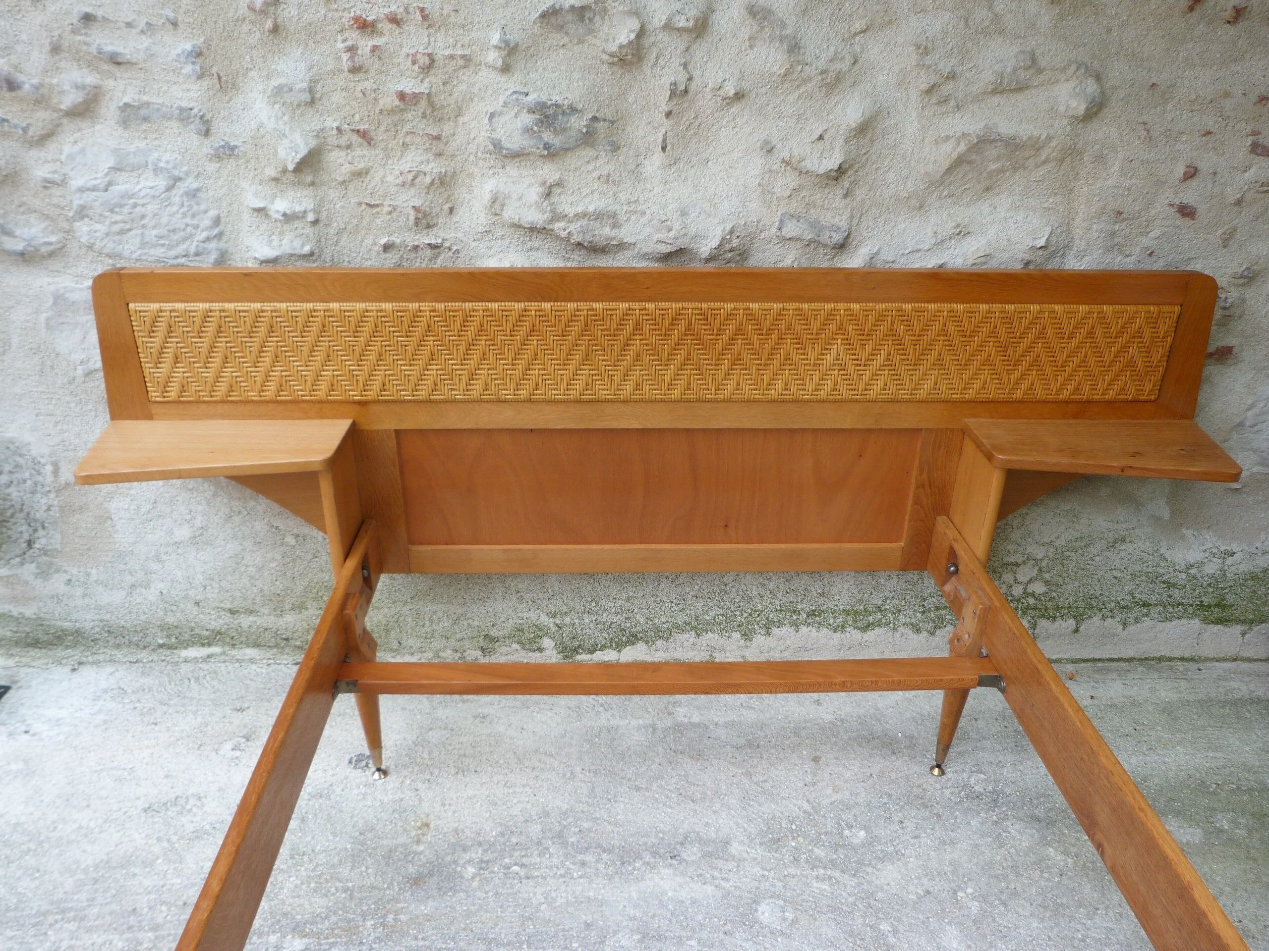 Wooden bed and rattan