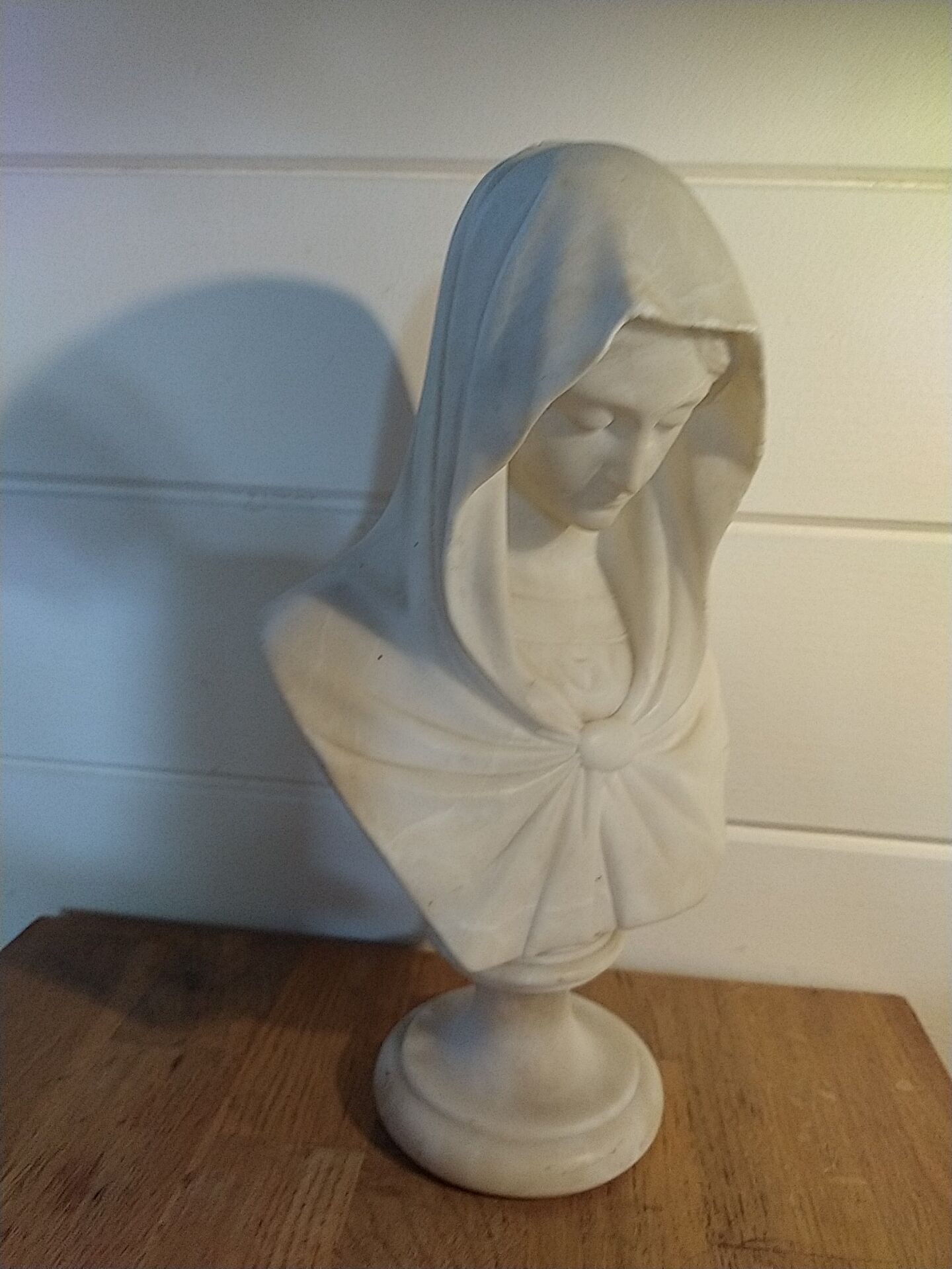 Bust of the Virgin in alabaster by Guglielmo Pugi.