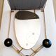 Matégot design mirror coat rack in brass and black perforated metal