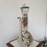 Old jug in flowered porcelain