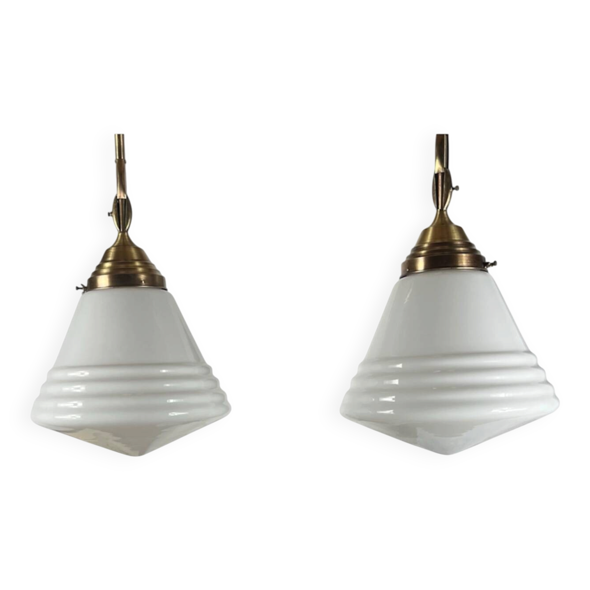 Pair of opaline glass pendant lights in white by Philips and brass from the 1920s.