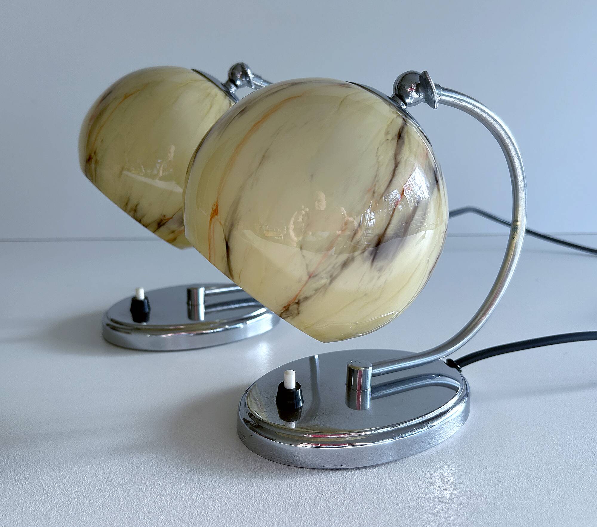Pair of art deco lamps, chrome glass