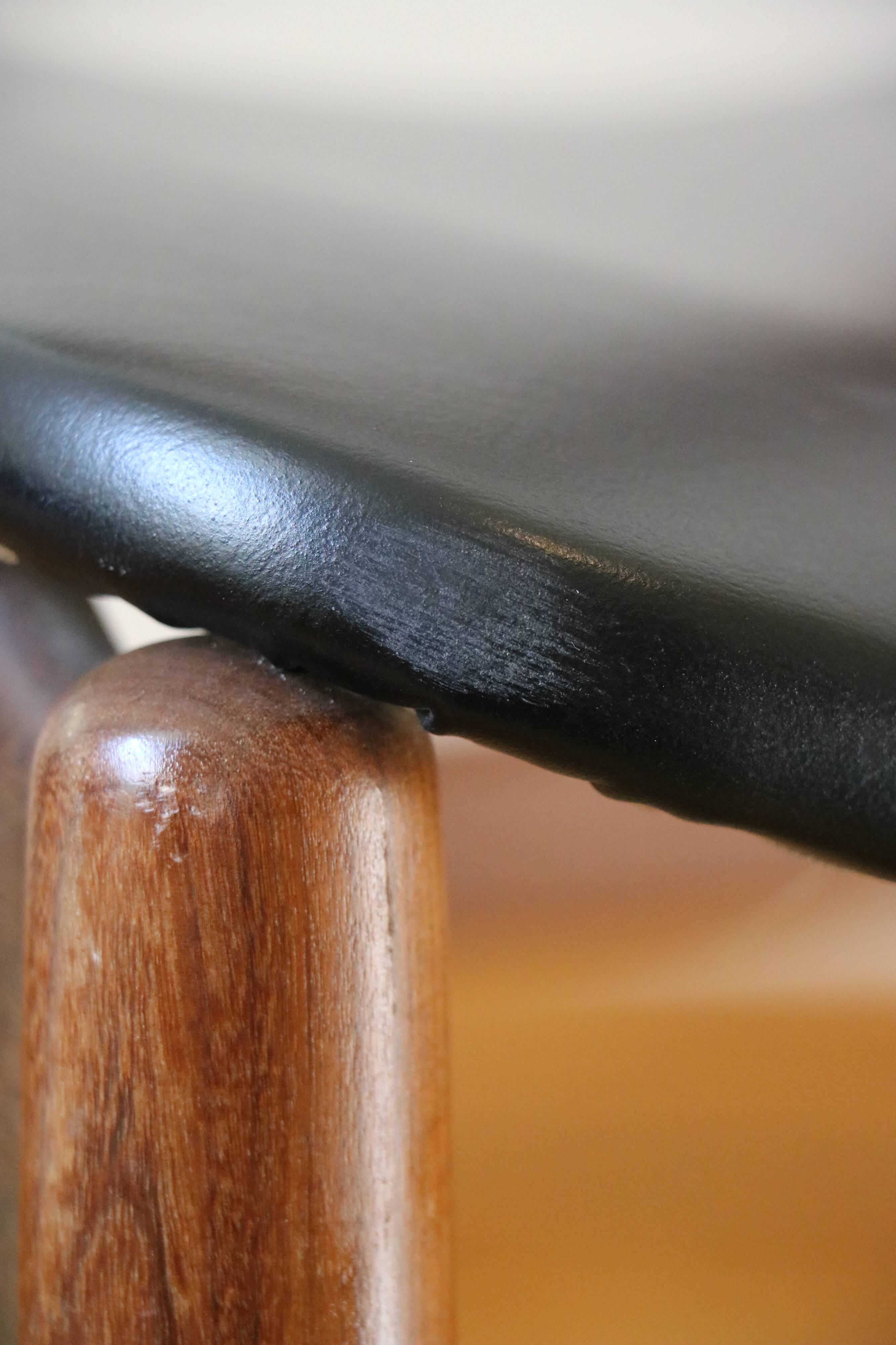 4 Scandinavian chairs in solid wood and black imitation leather