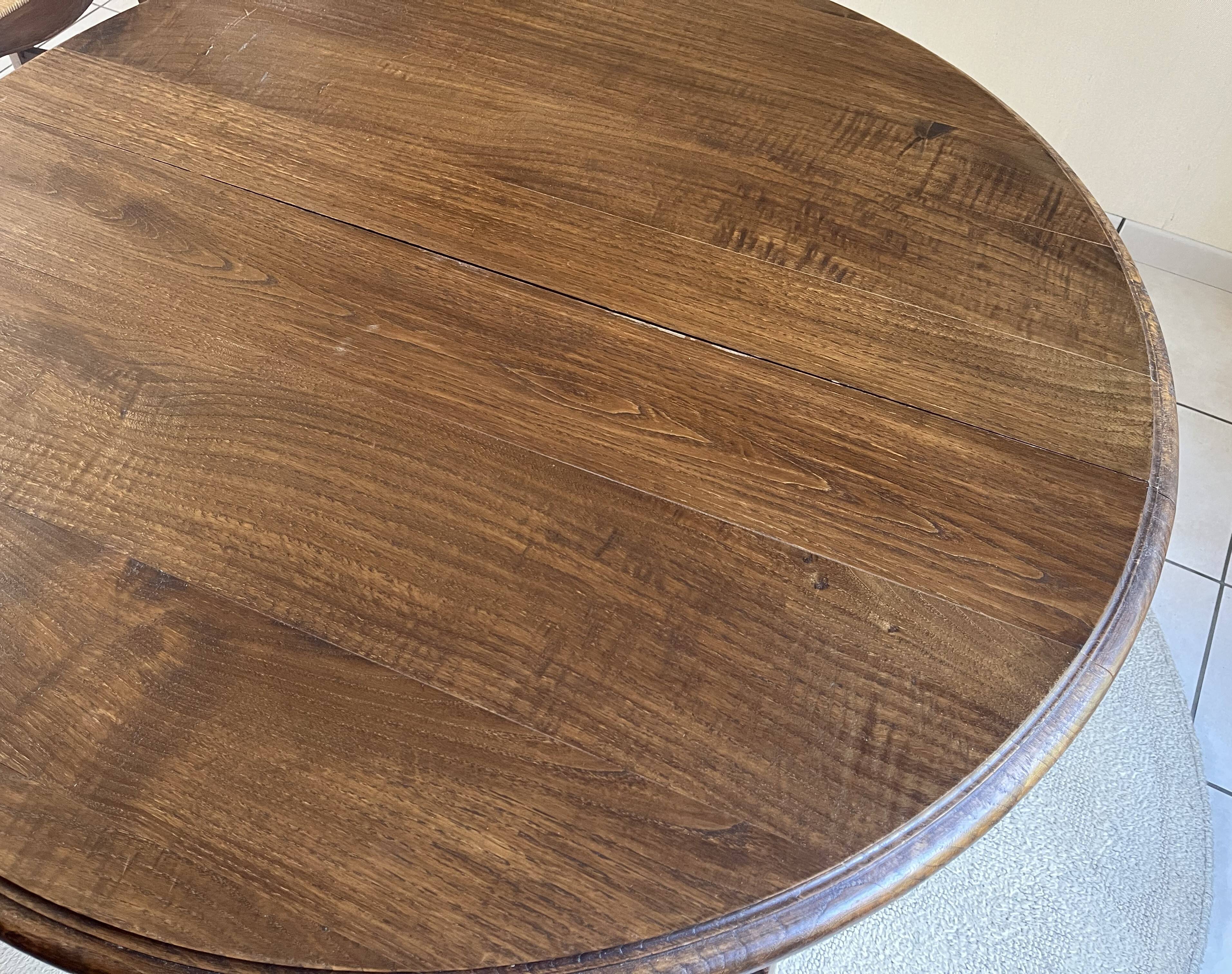 Solid chestnut table, diameter 120 cm with an extension of 50 cm - rené trotel