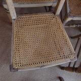 Suite of oak chairs; canated seats