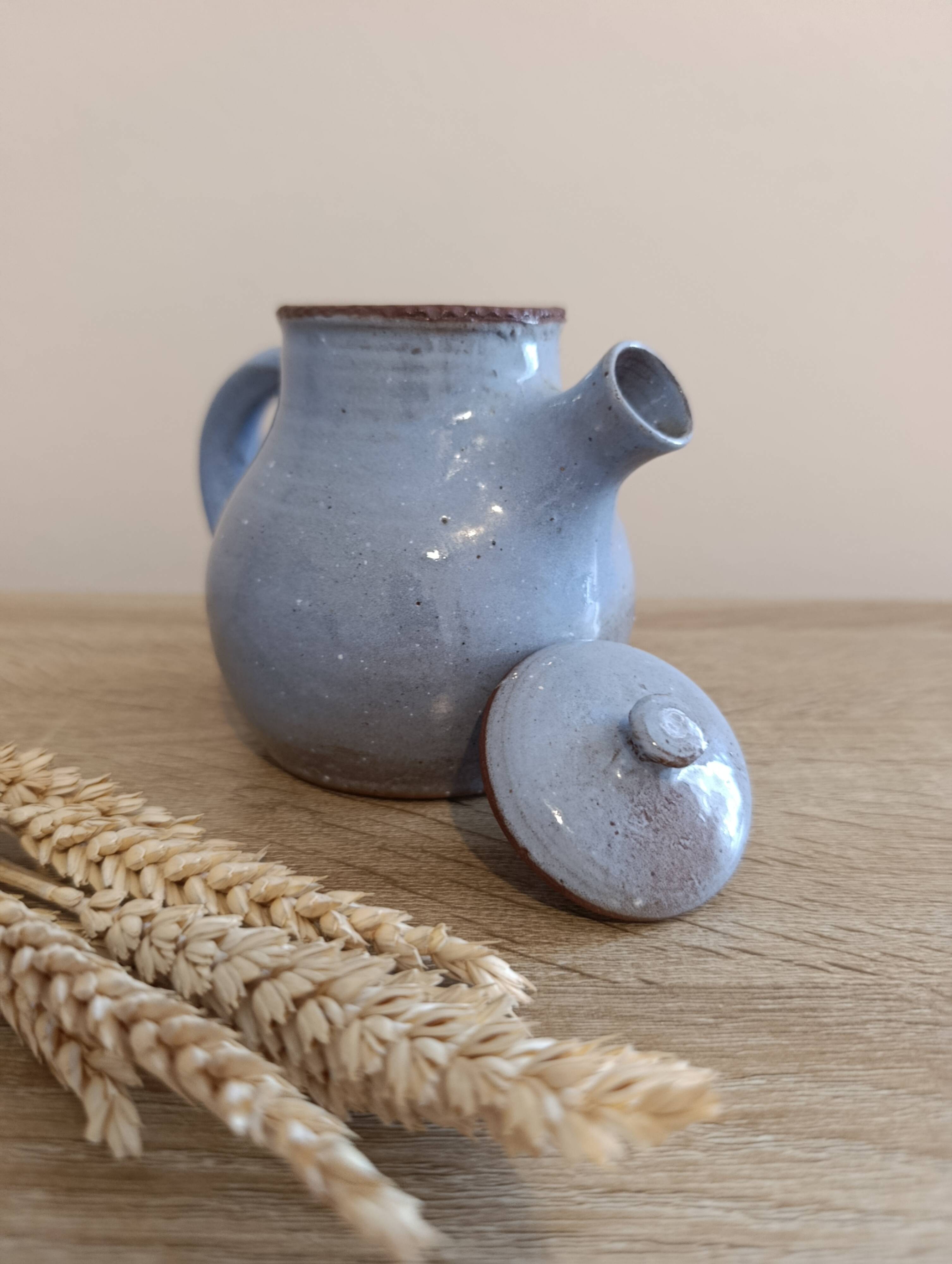 Ceramic teapot in blue/grey glaze, signed by Jeanne and Norbert Pierlot.
