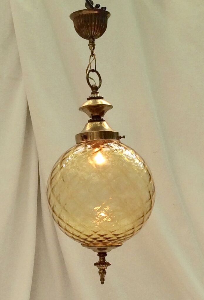 Amber glass suspension with brass