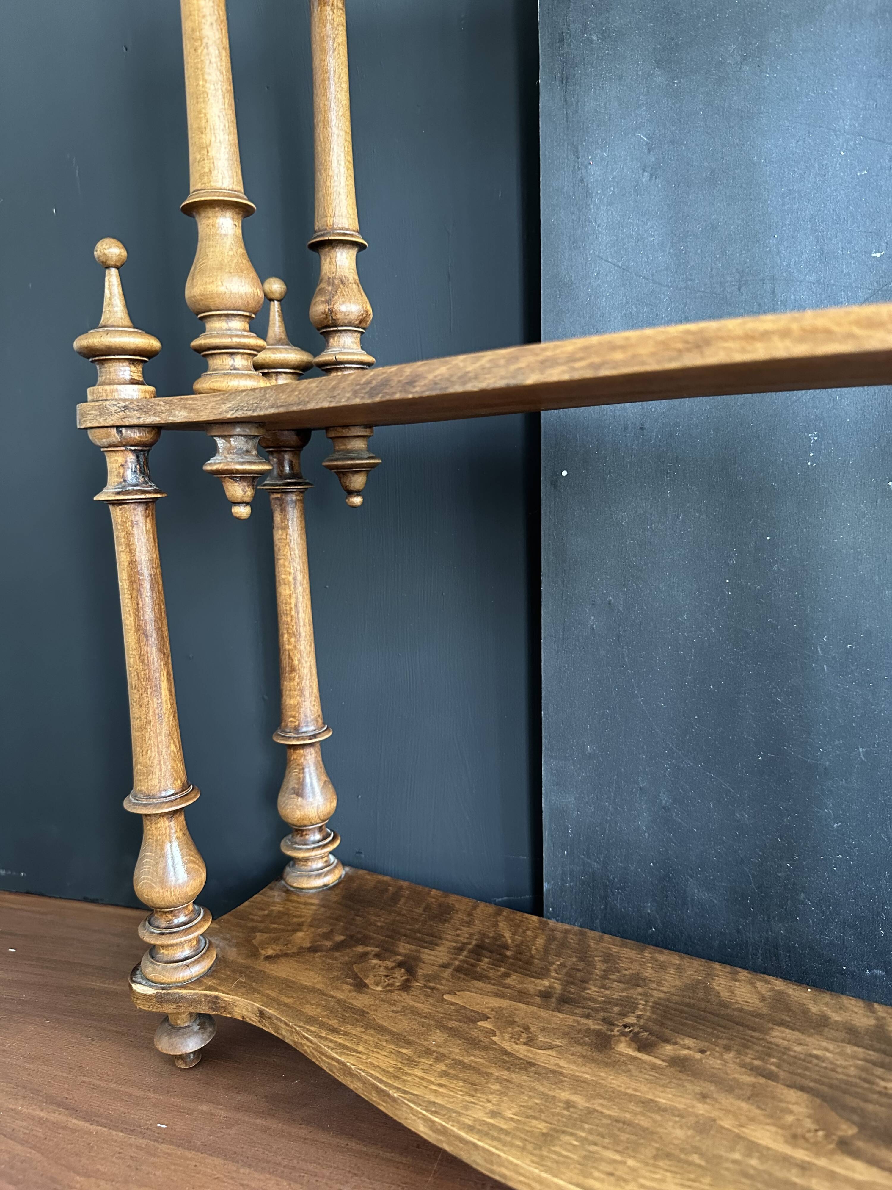Antique turned wooden shelf with three levels, around 1900.