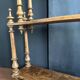 Antique turned wooden shelf with three levels, around 1900.