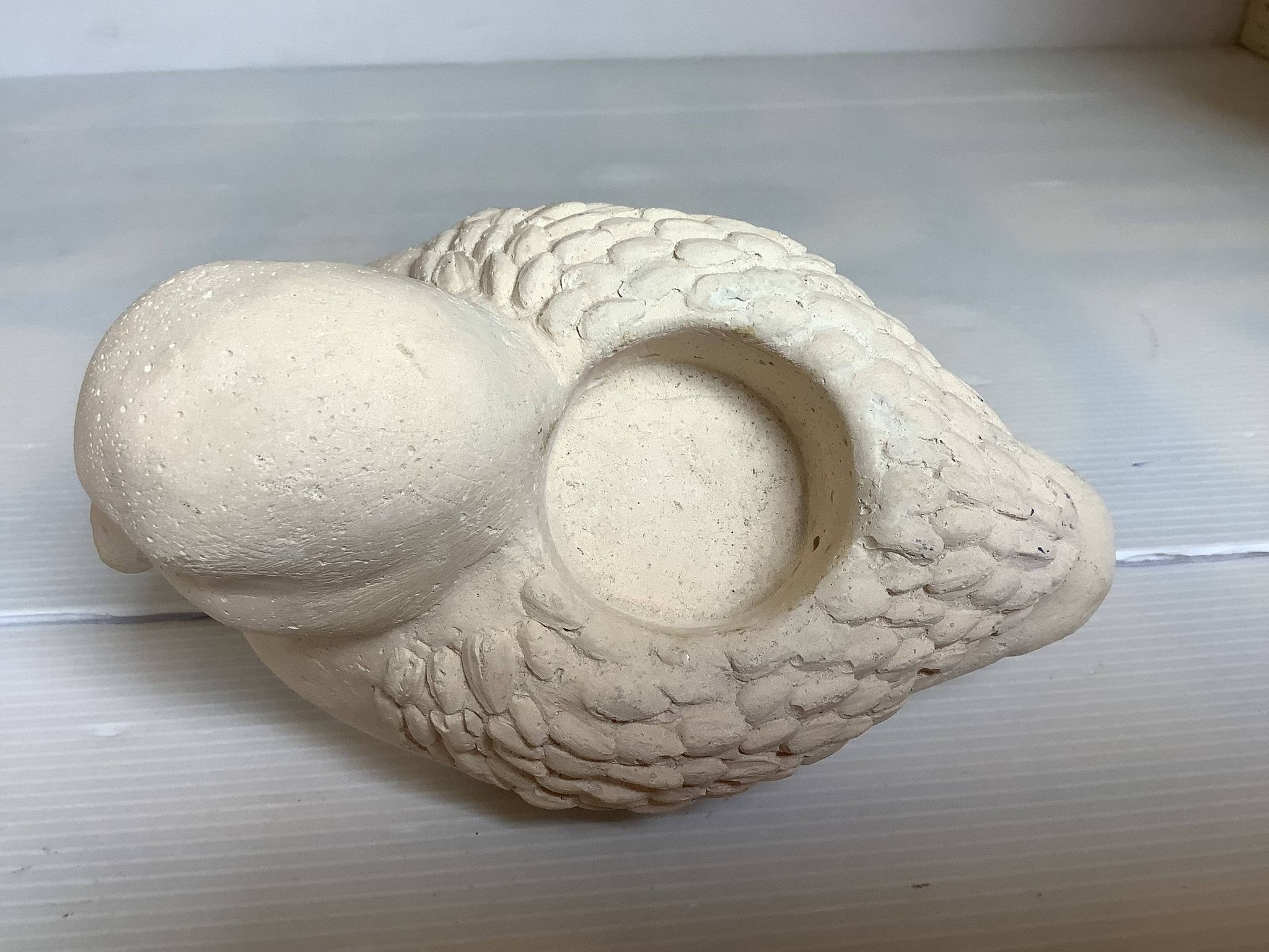 Bird candle holder for indoor or outdoor use.