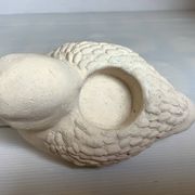 Bird candle holder for indoor or outdoor use.