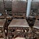 Series of 8 Renaissance chairs in oak with brown patina circa 1850