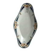 Longwy ramekin with blue and orange floral decoration.
