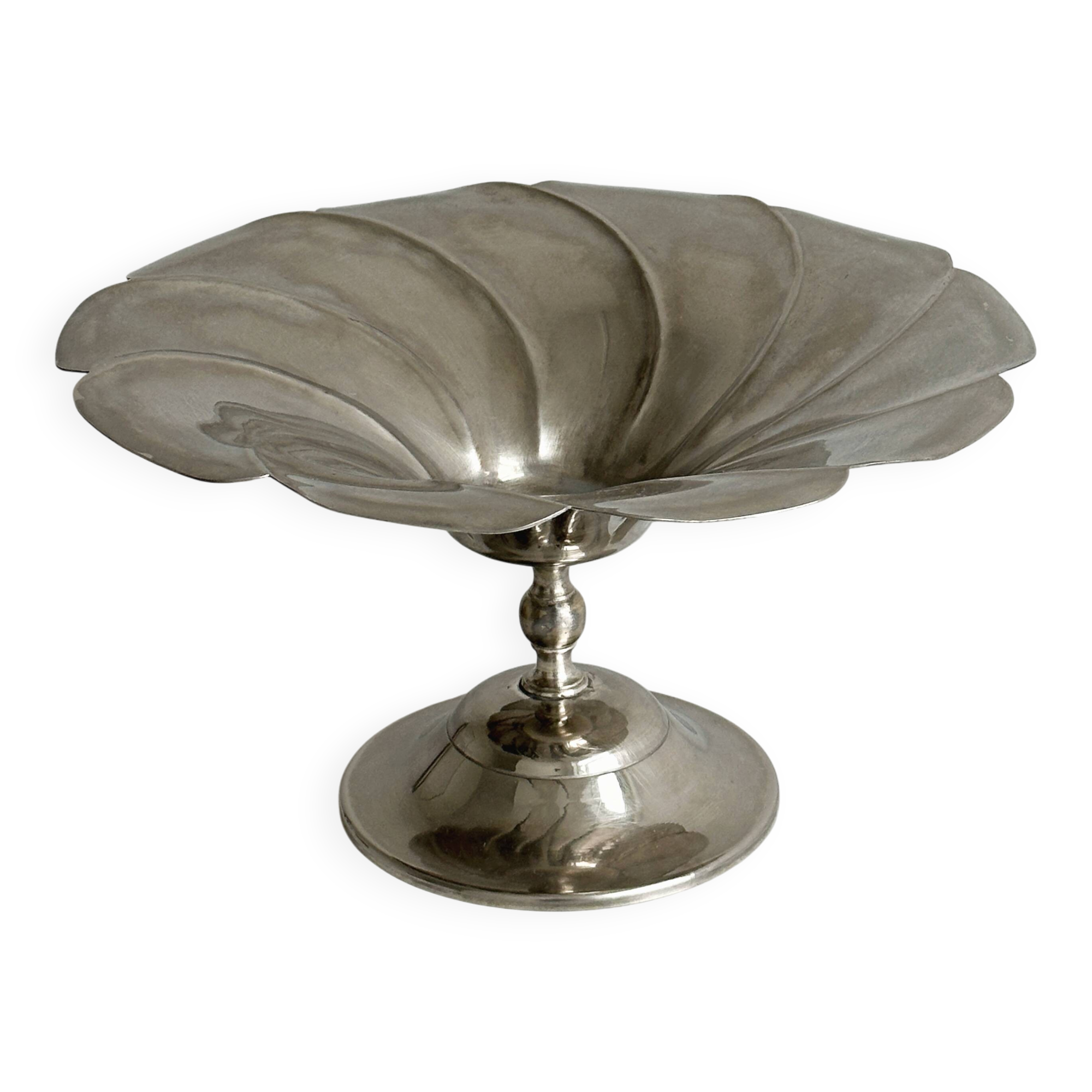 large dish on a shiny metal stand
