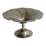 large dish on a shiny metal stand