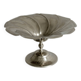 large dish on a shiny metal stand