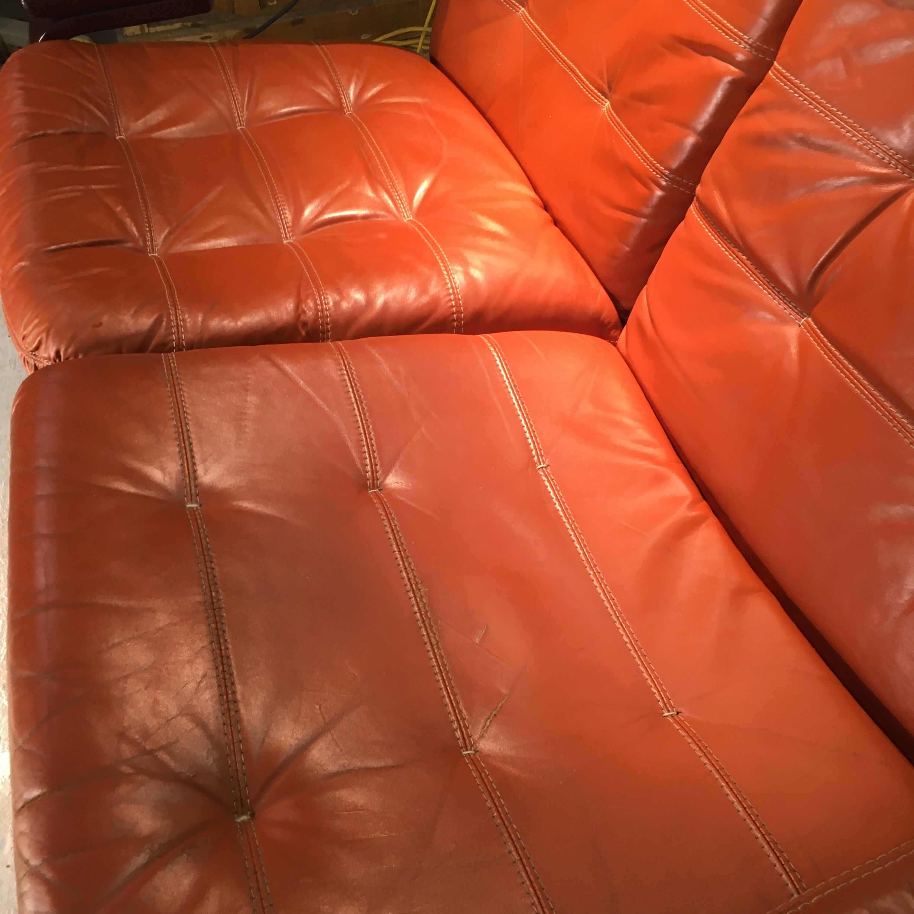 Wooden and ochre leather sofa