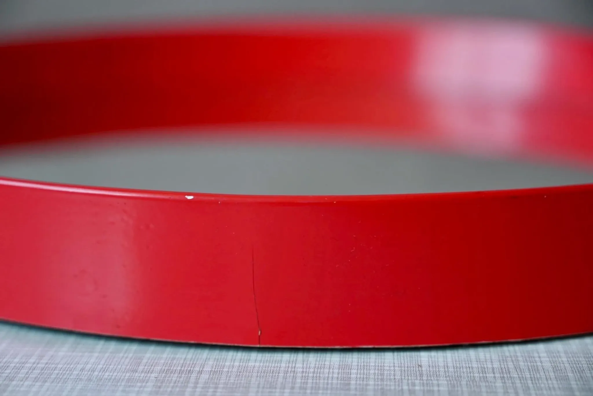 Round Pop Art mirror from the 60s-70s in bright red plastic.