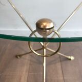 Round coffee table of neoclassical style in brass