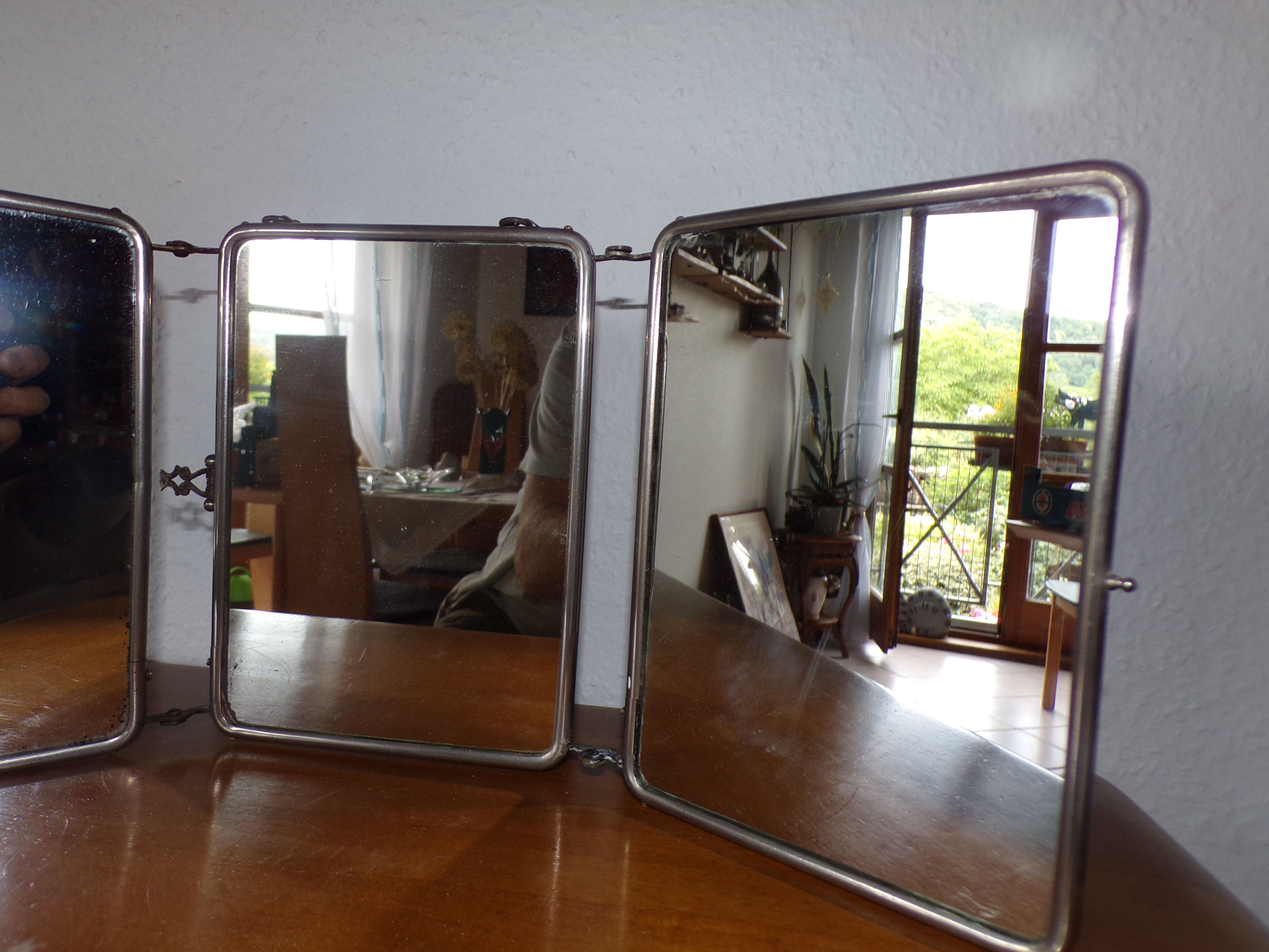 Old tryptic barber mirror