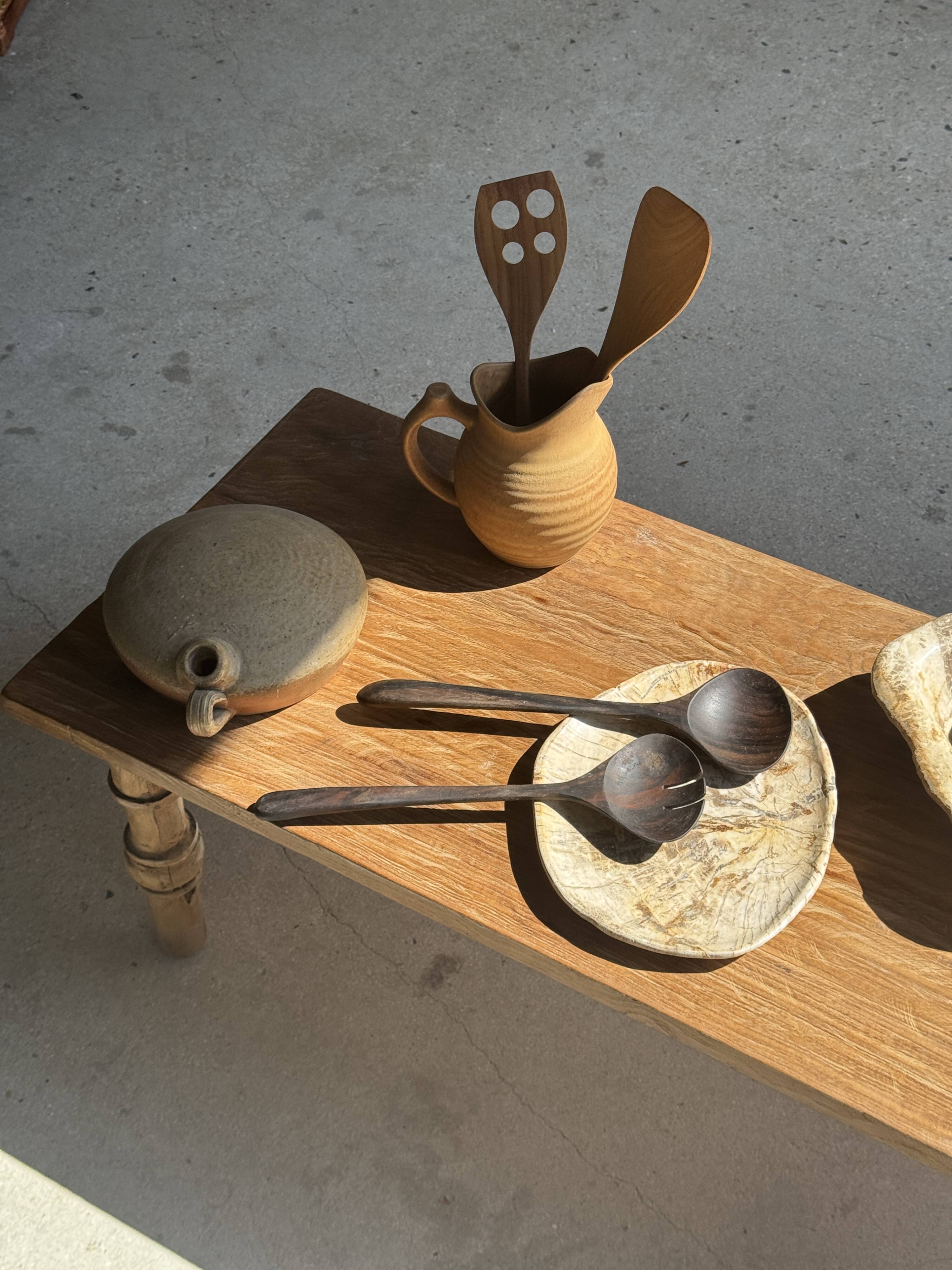 Pair of salad servers or kitchen utensils in blackened teak L30 D9