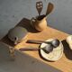 Pair of salad servers or kitchen utensils in blackened teak L30 D9