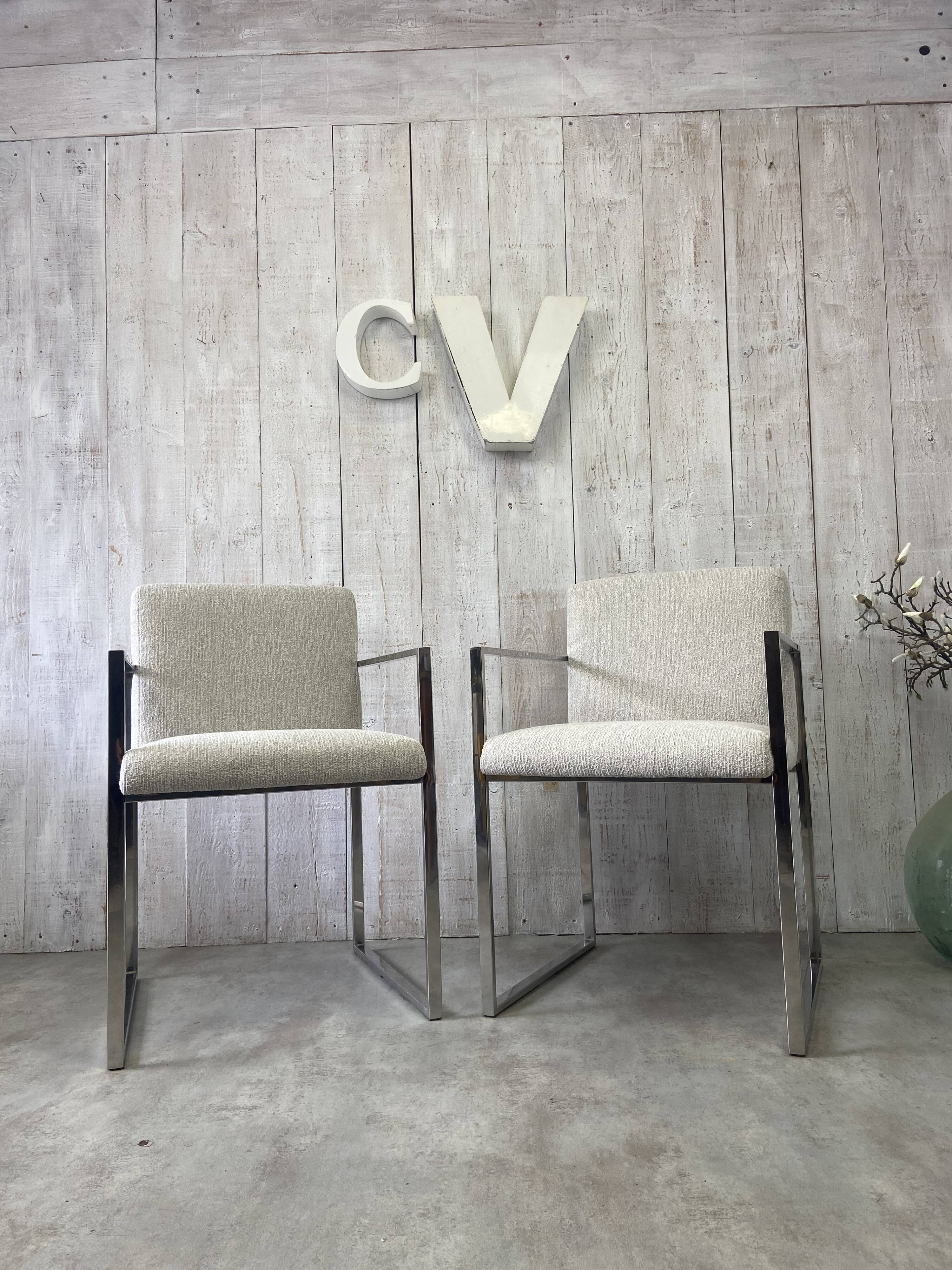 Pair of stainless steel armchairs from the 70s
