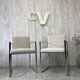 Pair of stainless steel armchairs from the 70s