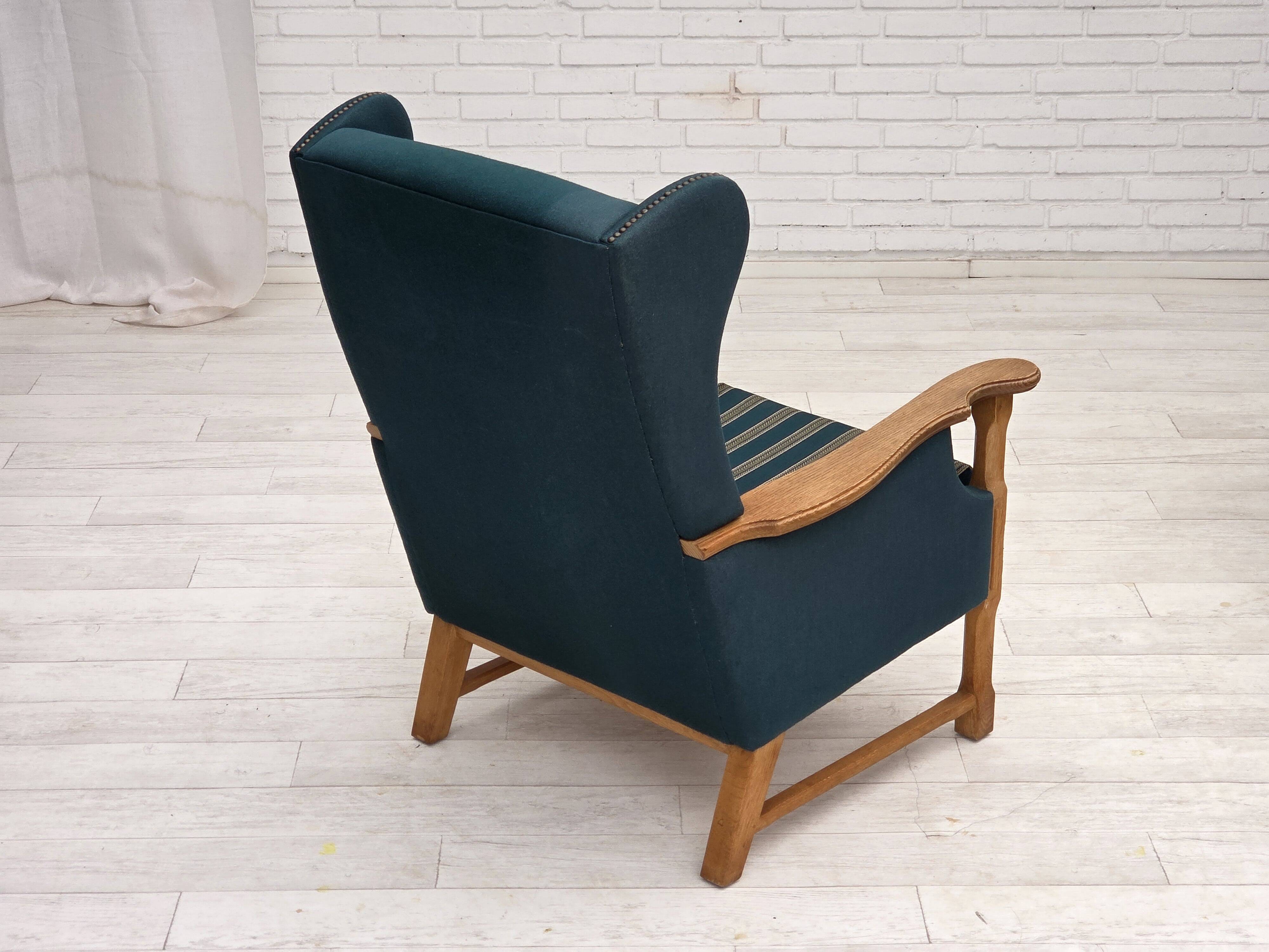 1970s, Danish highback armchair, furniture wool, solid oak wood.
