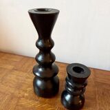 Pair of black turned wood candlesticks
