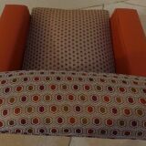 Retro vintage rockabilly armchair in orange faux leather and vintage fabrics