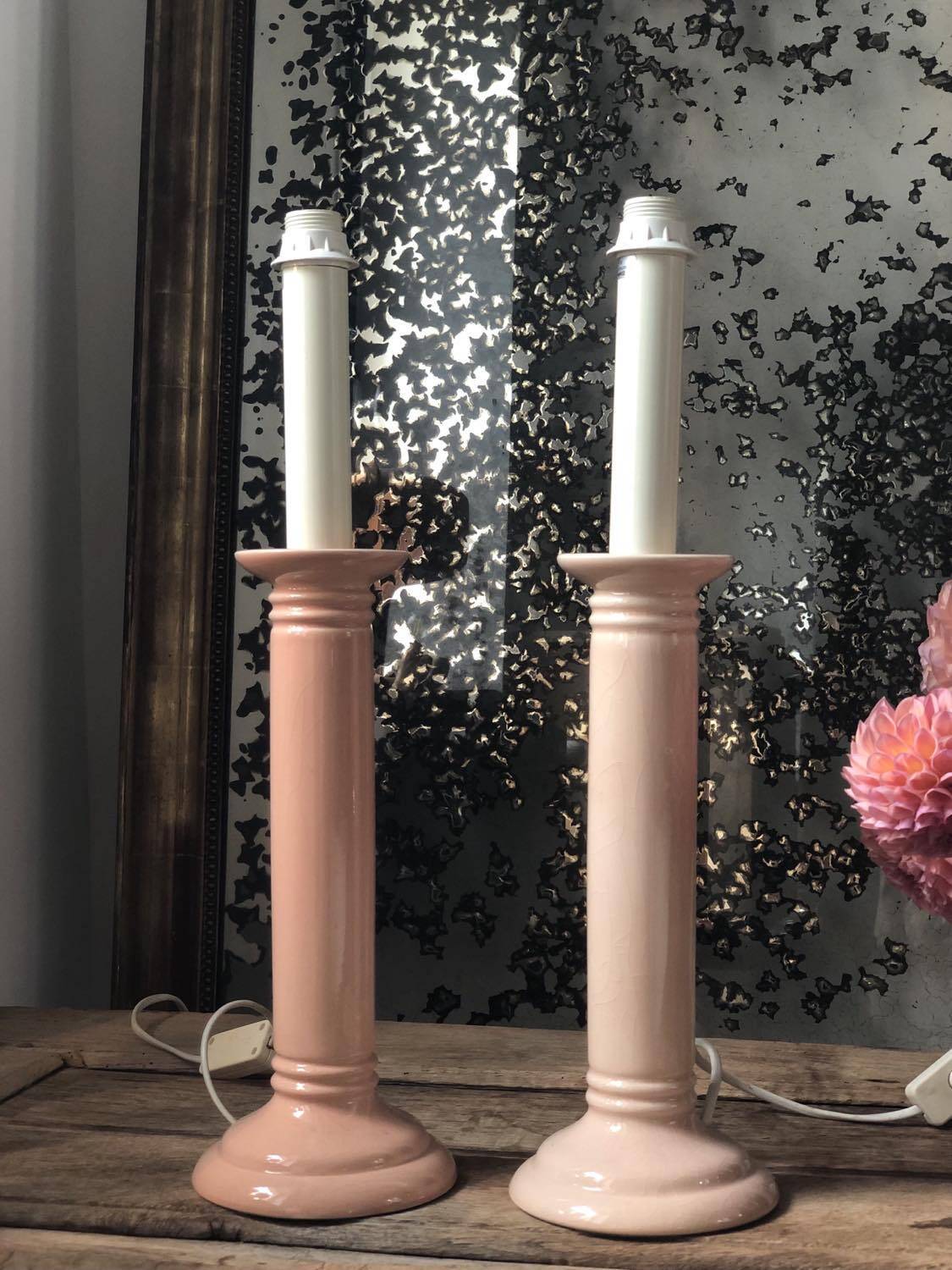 Pair of vintage salmon pink candlestick shaped ceramic lamp bases