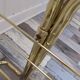 Pair of vintage smoked glass and brass bedside tables
