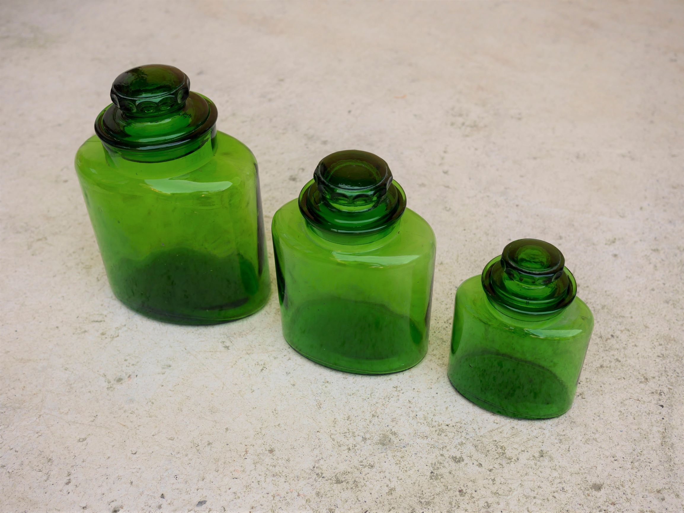 Series of 3 vintage glass jars